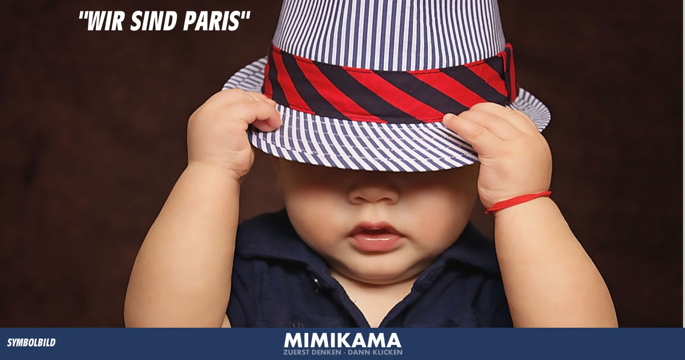"Es geht ein Bild rum mit einem Baby drauf, welches ein Armband um hat auf dem “wir sind Paris” steht."